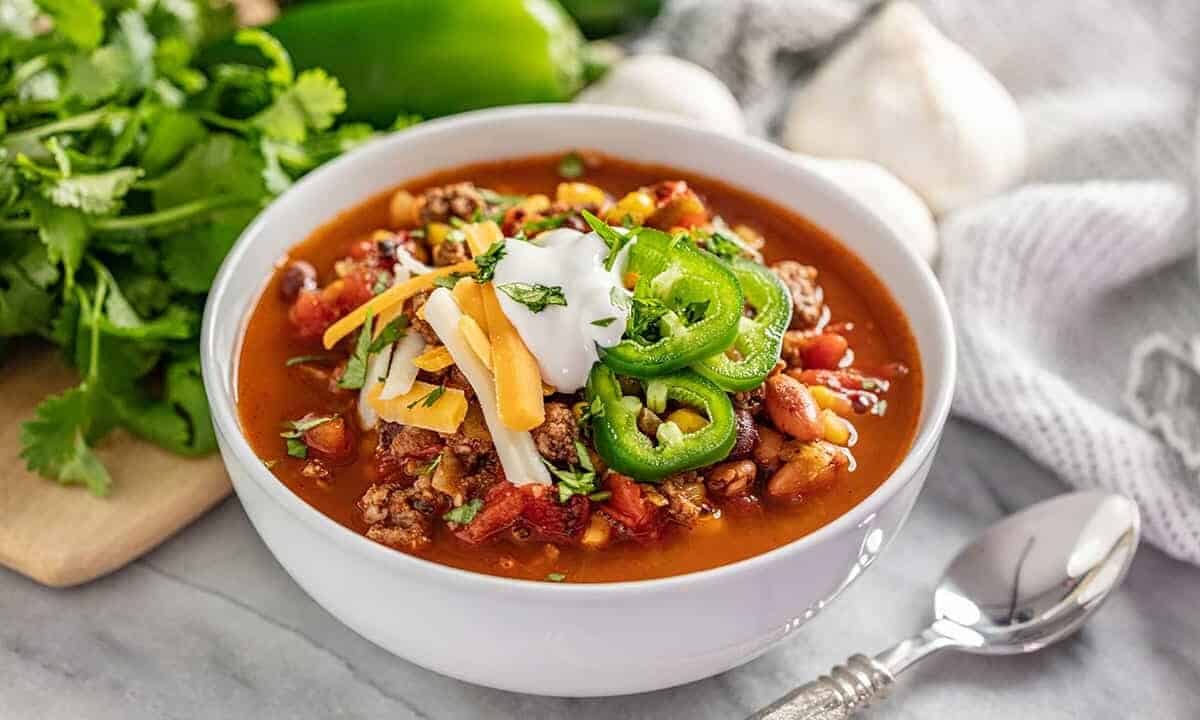 Taco soup in white bowl