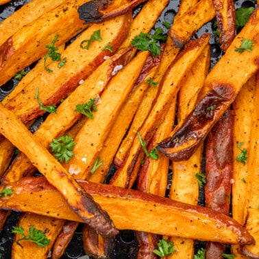 Overhead close up view of air fryer sweet potato fries.