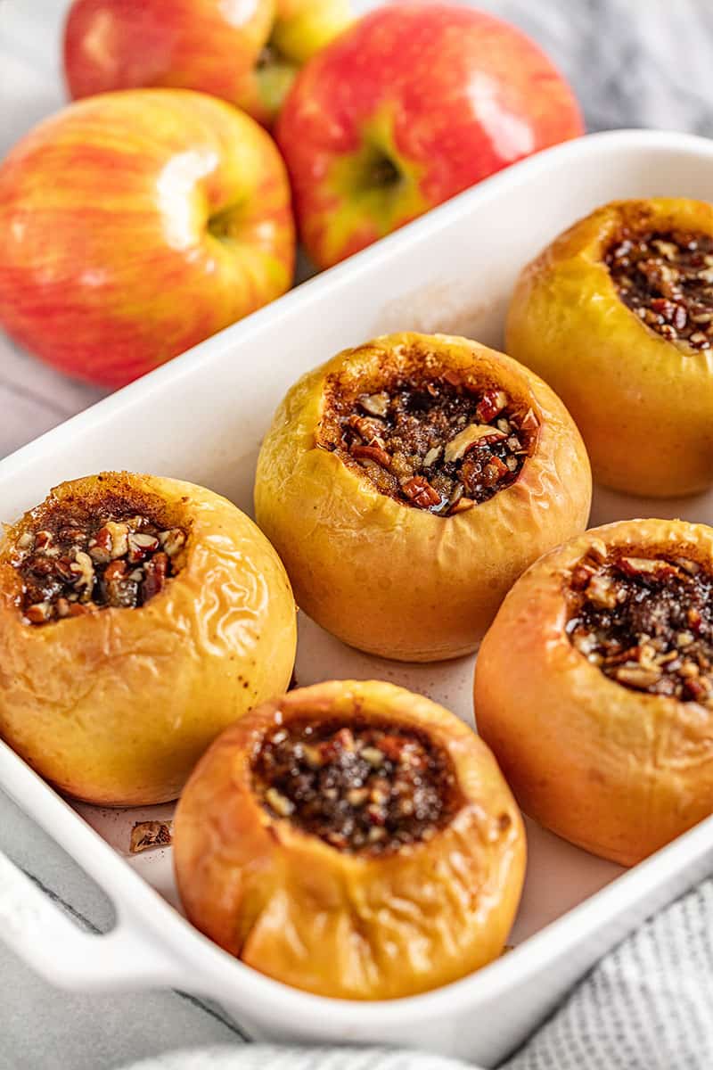 Baked Apples in a white baking dish.