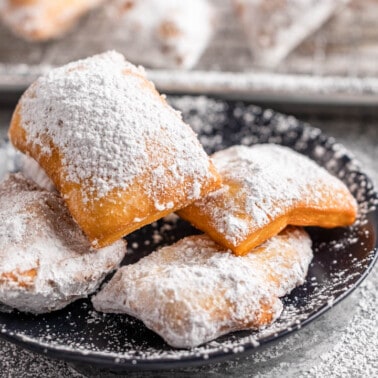 A dessert plate filled with beignets.