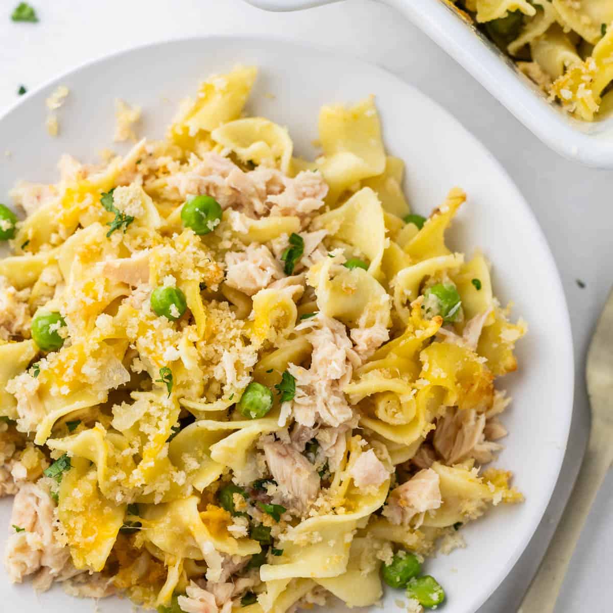 Overhead view of tuna casserole on a dinner plate.