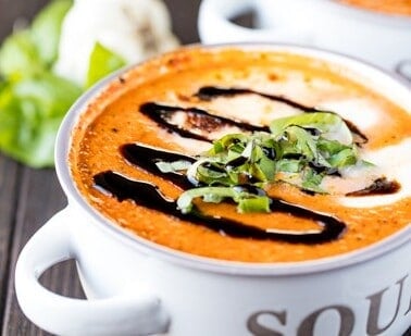 Caprese soup in a white soup bowl