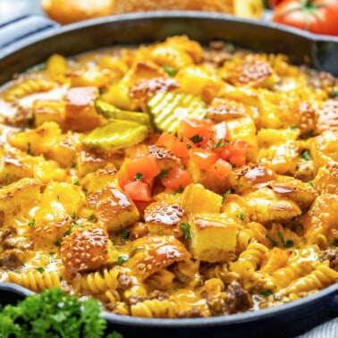 Cheeseburger casserole in a cast iron skillet.