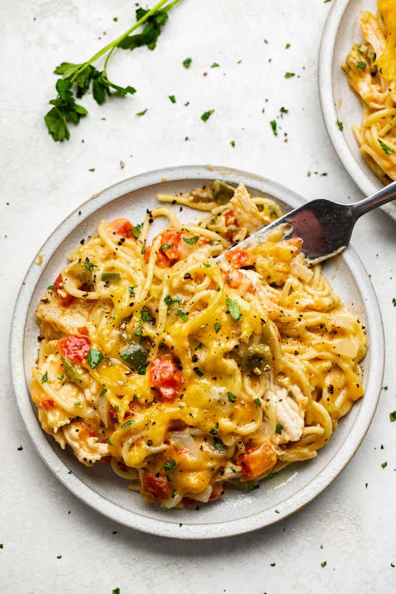 An overhead view of a plate of baked chicken spaghetti. 