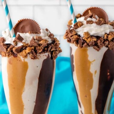 Two Chocolate Peanut butter swirl milkshakes.