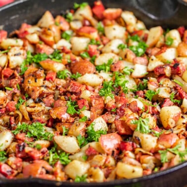 Corned beef hash in a cast iron skillet.