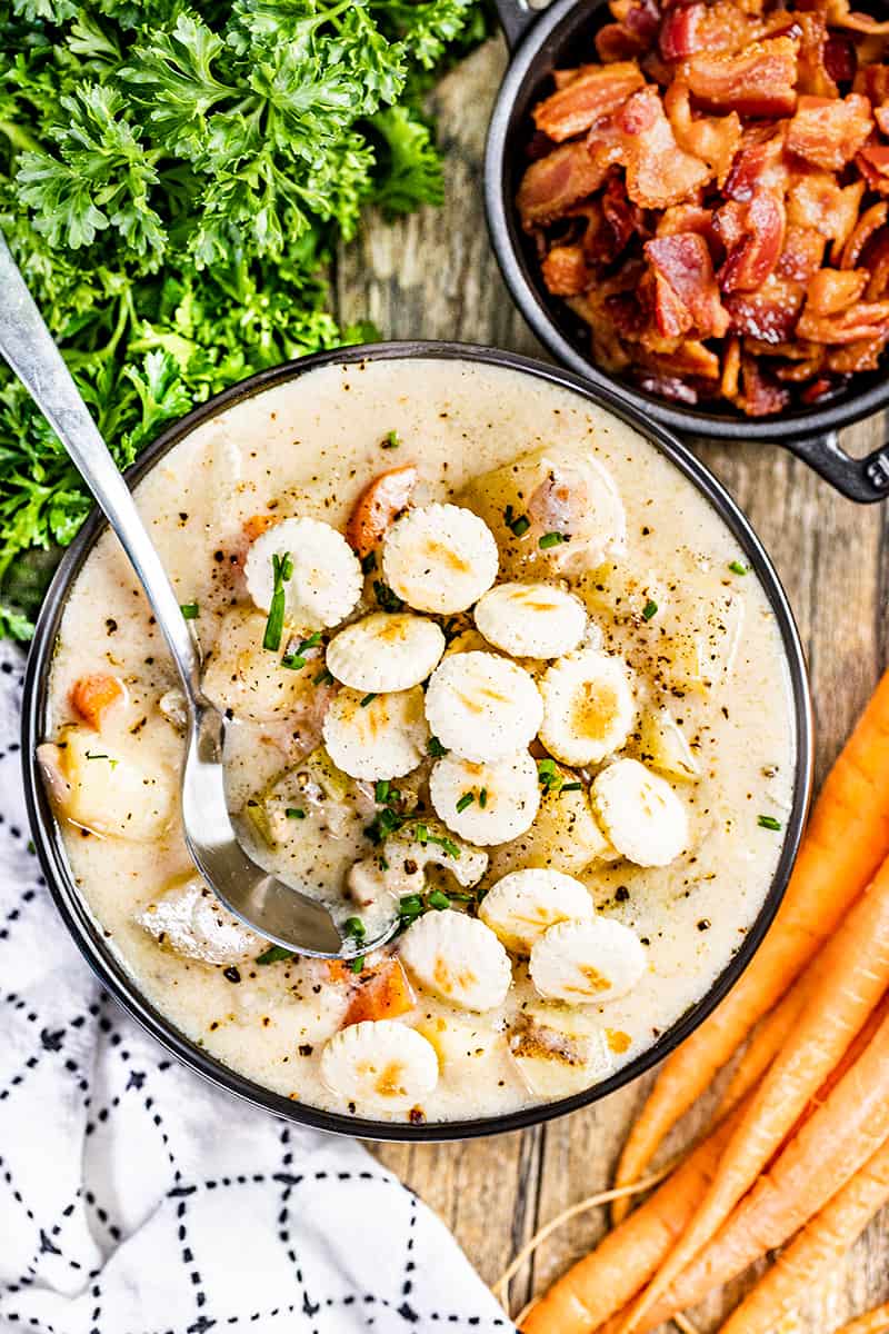 Overhead view of a bowl of clam chowder.