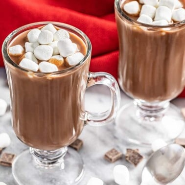 Close up view of two mugs filled with decadently thick Italian Hot Chocolate