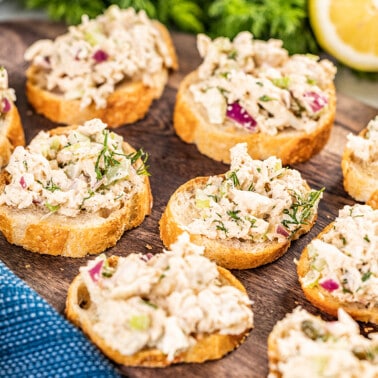 Crab salad on slices of baguette.