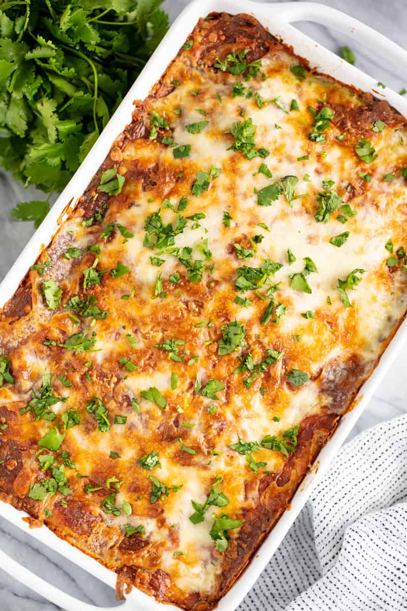 Bird's eye view of Chicken Enchilada Casserole in a cooking dish.