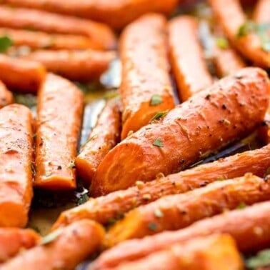 Honey roasted carrots on a baking sheet.