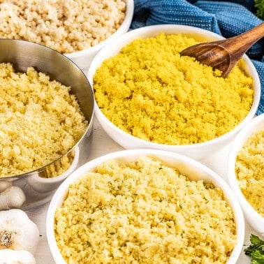 Close up view of couscous in bowls.