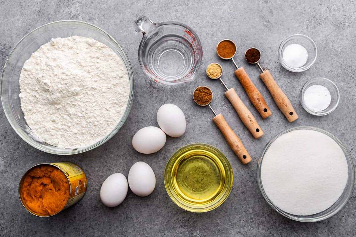 An overhead view of the ingredients needed to make pumpkin bread.