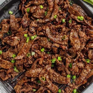 Korean Beef Bulgogi in a cast iron skillet.