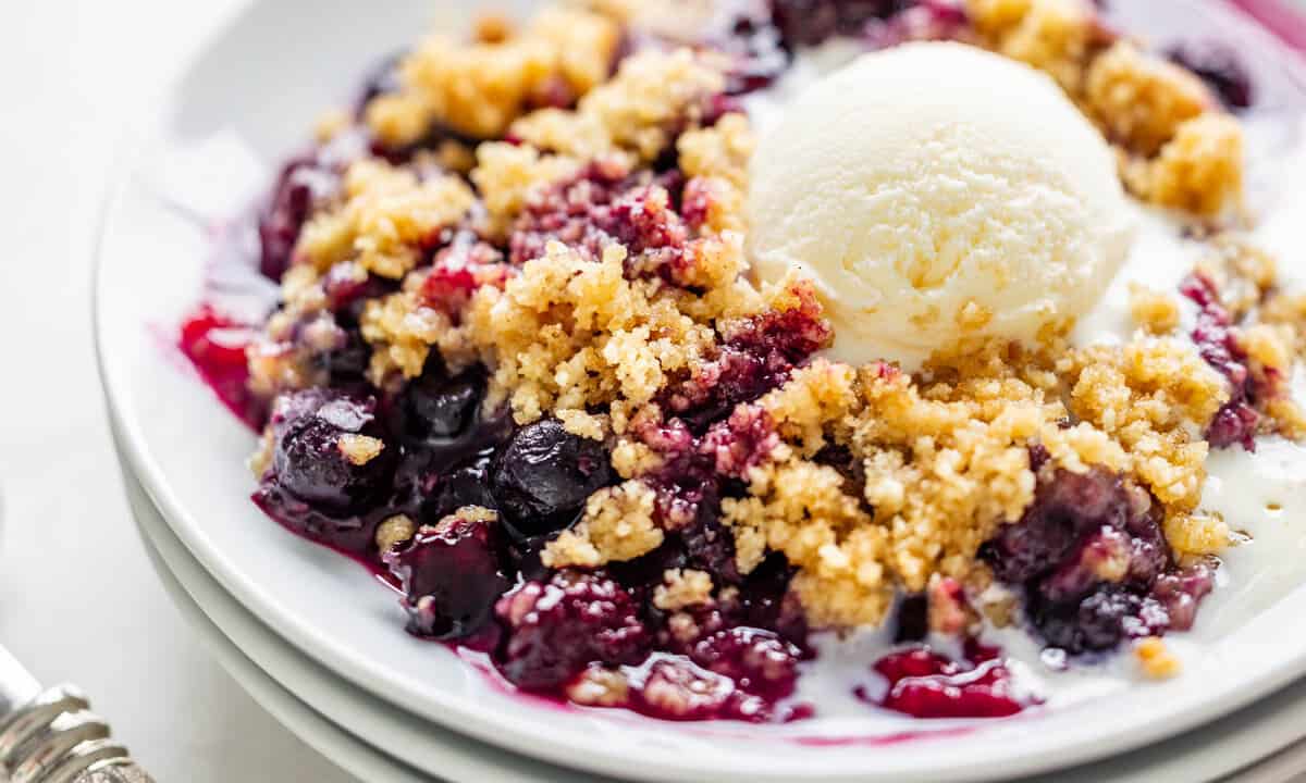 Close up view of mixed berry crumble.