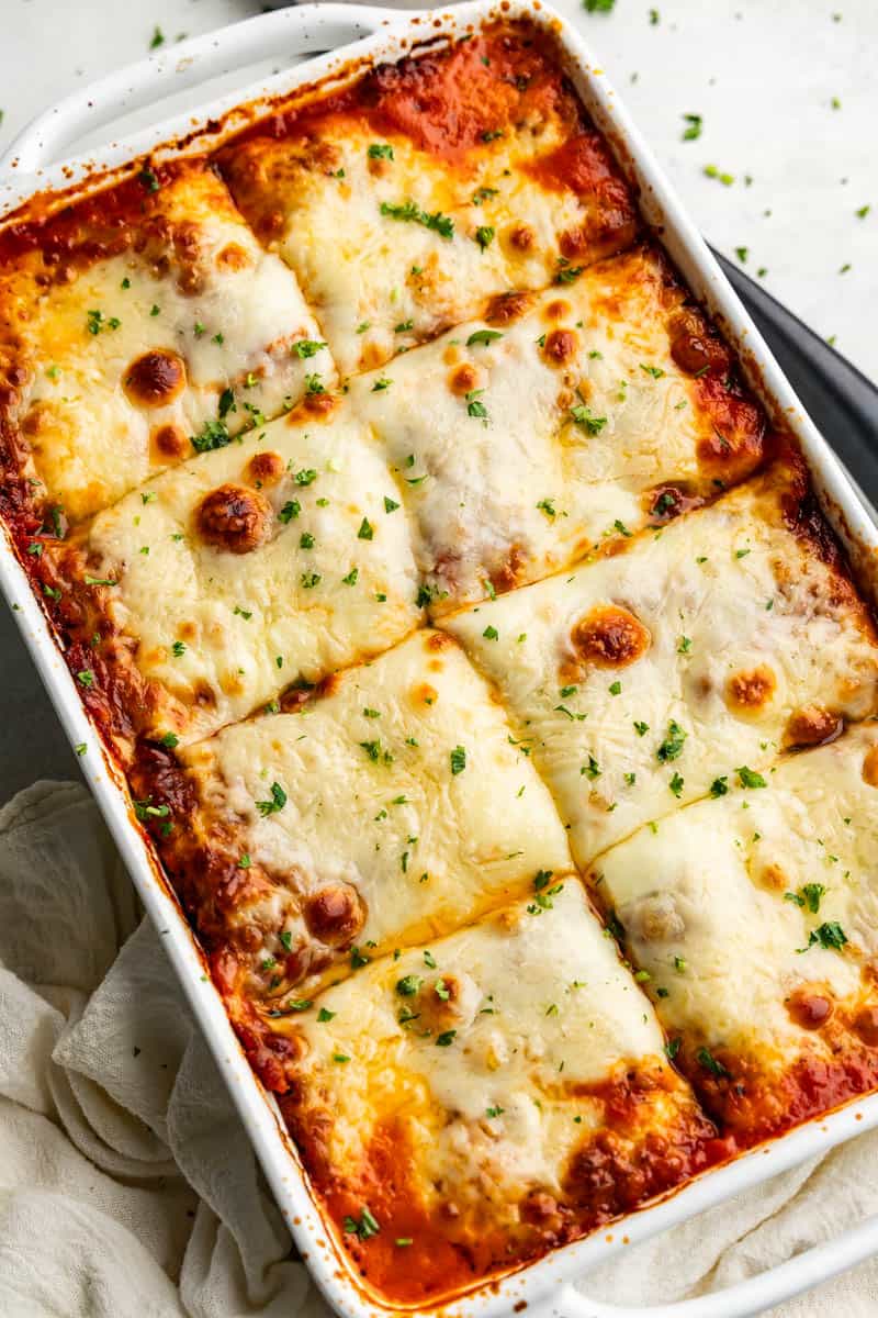 An overhead bird seye view of a pan of homemade lasagna.