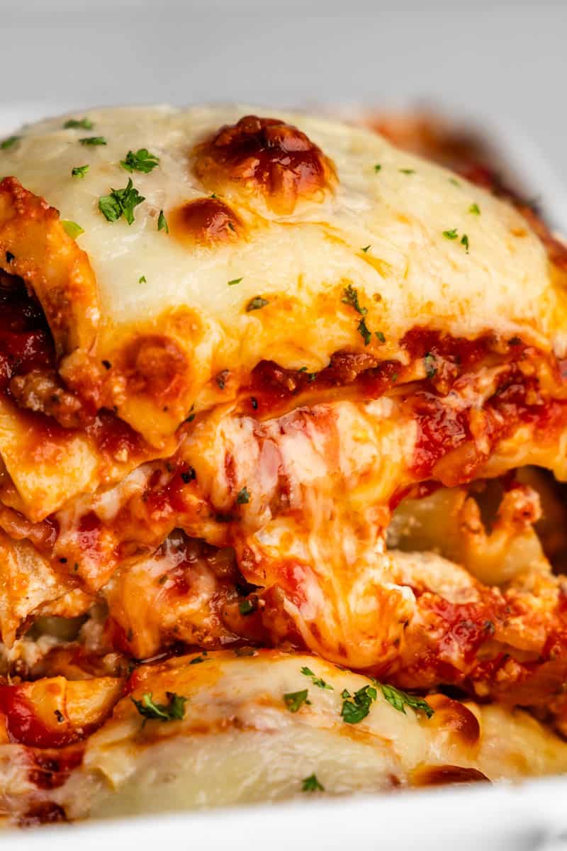 A close up view of a slice of lasagna.