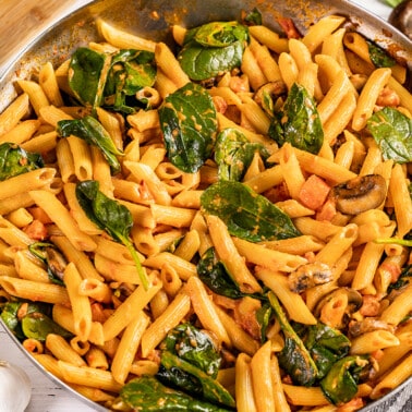 Overhead view of penne rosa in a skillet.