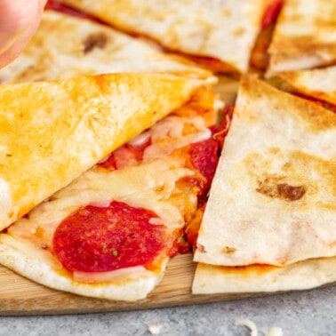 Close up view inside a pizza quesadilla.