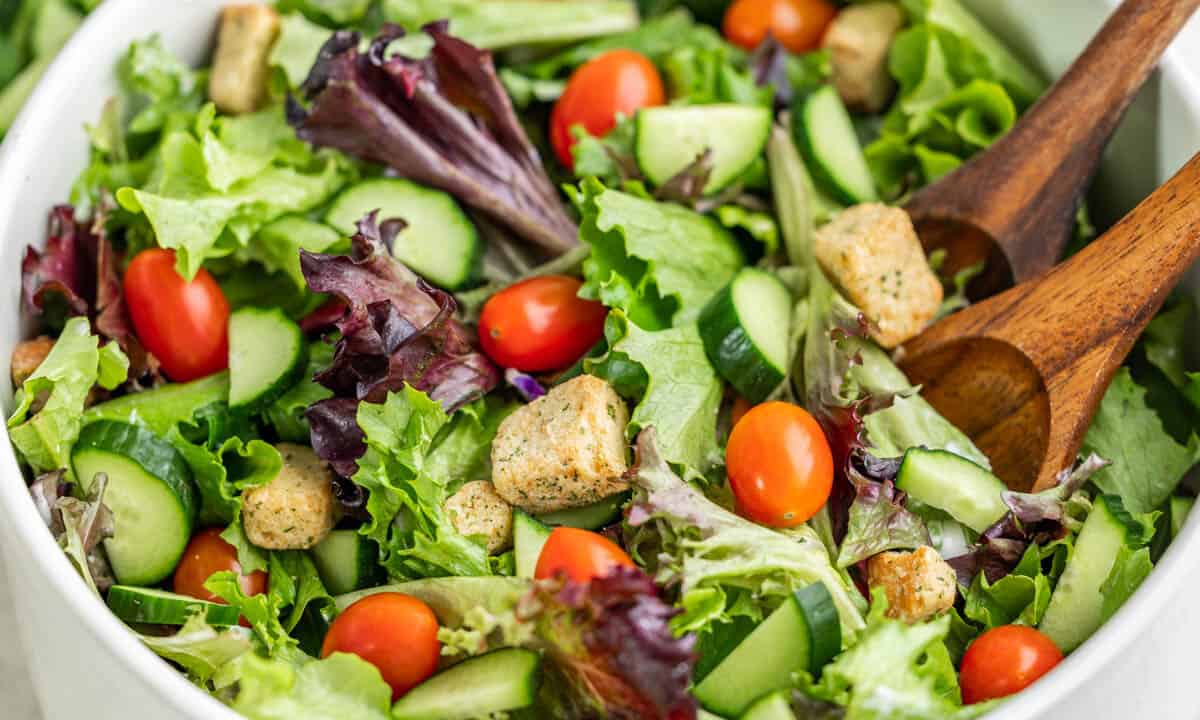 Close up view of a side salad in a serving bowl.