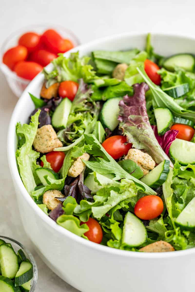 Close up view of a side salad in a serving bowl.