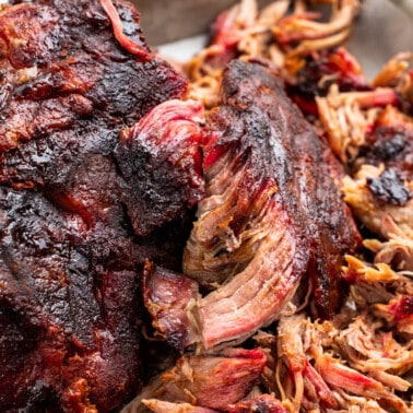 Close up view of a partially shredded pork butt.