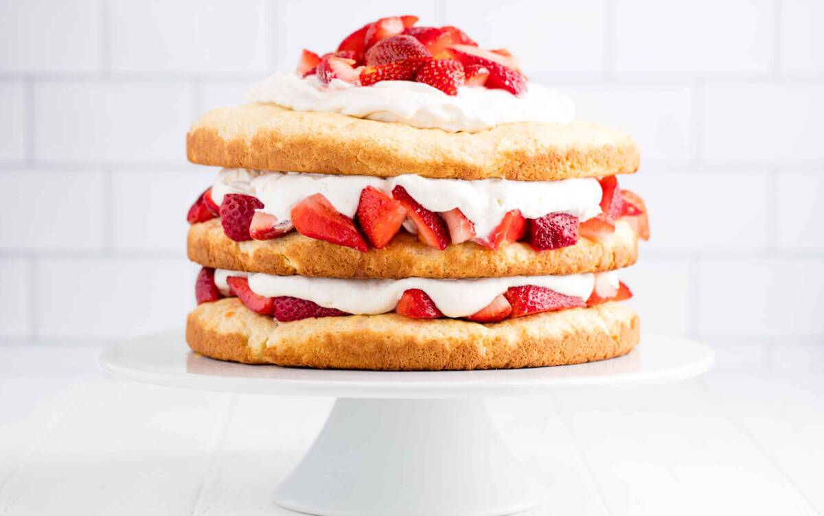 Strawberry Shortcake on a cake stand.