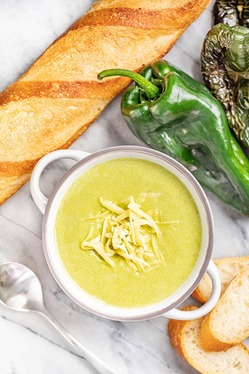 Bird's eye view of Roasted Poblano White Cheddar Soup in a white bowl.